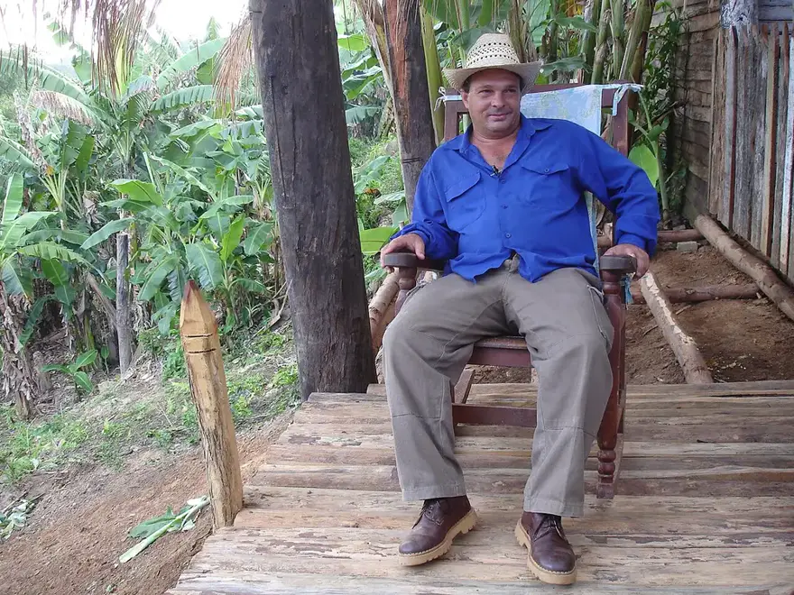 A tobacco farmer (veguero) on the porch of his farm in Viñales